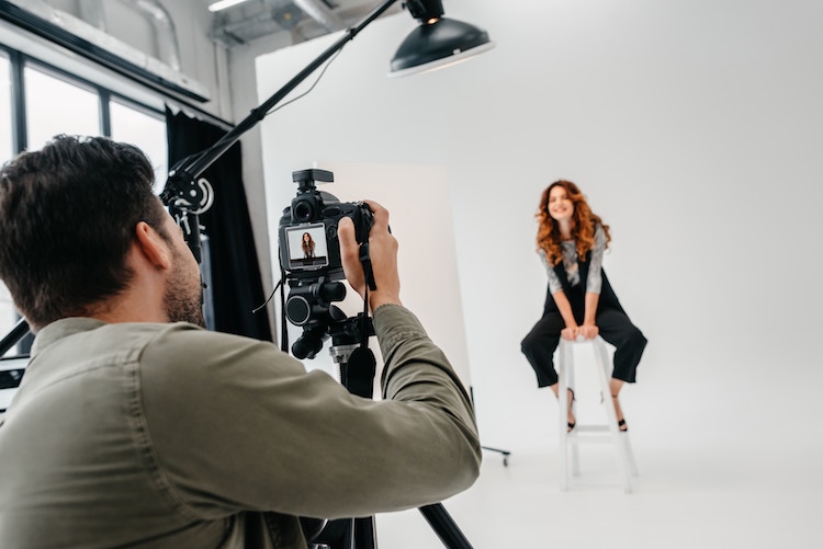 How can photographers make extra money during the holidays?